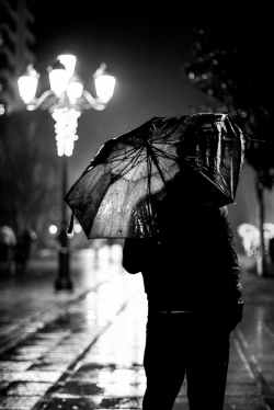 black and white man weather rainy